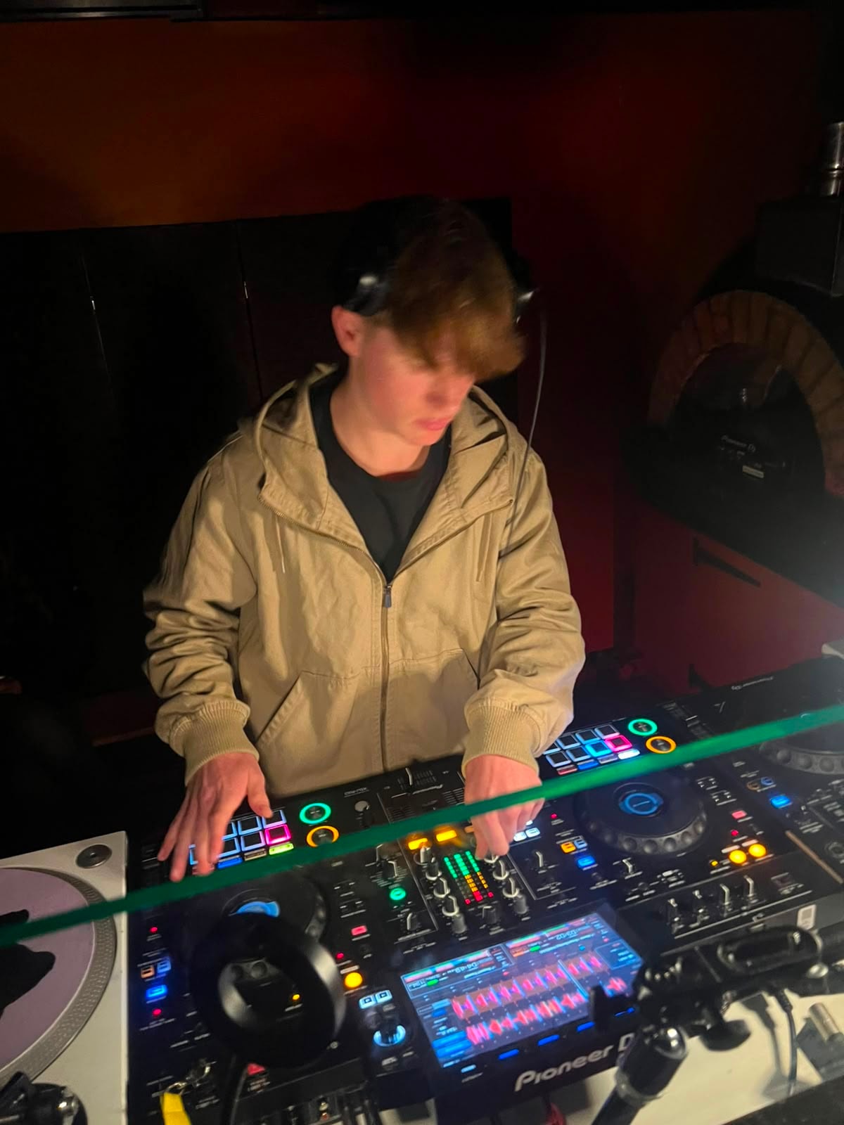 Joe Rowthorn performing behind the decks